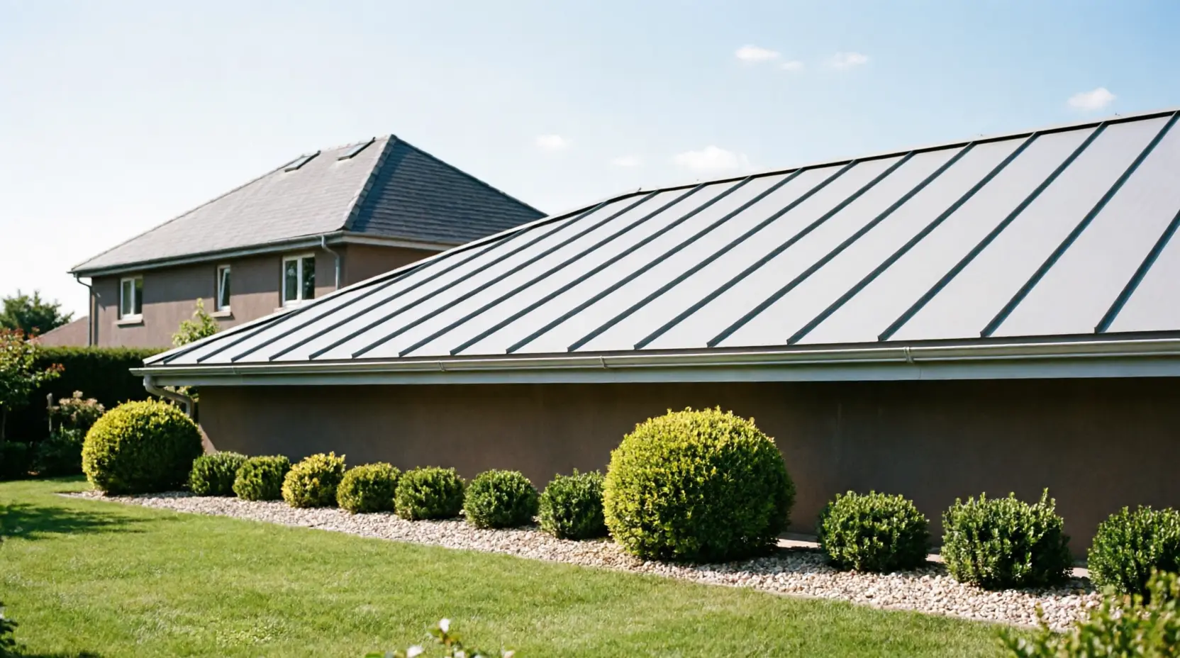 Completed metal-roofed rear extension.